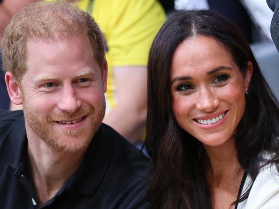 DUESSELDORF, GERMANY - SEPTEMBER 13: Prince Harry, Duke of Sussex and Meghan, Duchess of Sussex pose for a photograph as they attend the Wheelchair Basketball preliminary match between Ukraine and Australia during day four of the Invictus Games Düsseldorf 2023 on September 13, 2023 in Duesseldorf, Germany. (Photo by Chris Jackson/Getty Images for the Invictus Games Foundation)