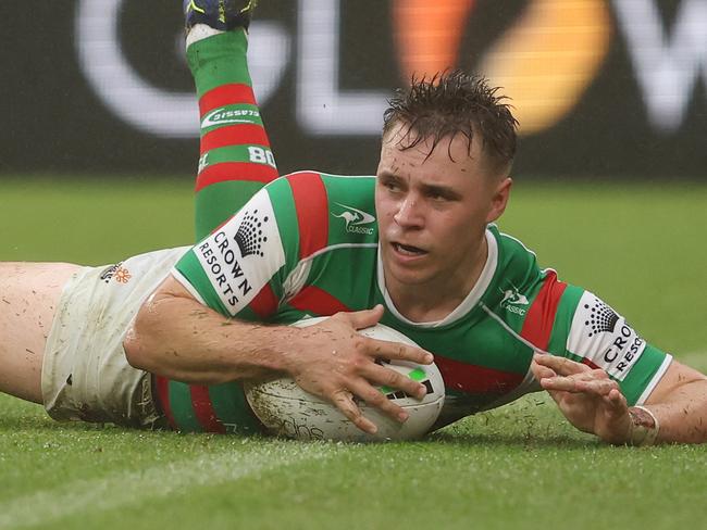 BRISBANE, AUSTRALIA - MAY 14: Blake Taaffe of the Rabbitohs scores a try during the round 10 NRL match between the New Zealand Warriors and the South Sydney Rabbitohs at Suncorp Stadium, on May 14, 2022, in Brisbane, Australia. (Photo by Chris Hyde/Getty Images)