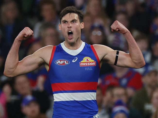 MELBOURNE, AUSTRALIA - AUGUST 18: Sam Darcy of the Bulldogs celebrates kicking a goal during the round 23 AFL match between Western Bulldogs and North Melbourne Kangaroos at Marvel Stadium, on August 18, 2024, in Melbourne, Australia. (Photo by Daniel Pockett/Getty Images)