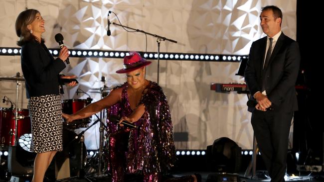 Iconic Adelaide cabaret superstar Hans bows down to Chief Public Health Officer in front of Premier Steven Marshall. Picture: Kelly Barnes/Getty Images