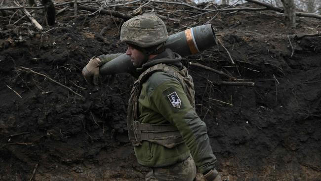 A Ukrainian soldier prepares to fire a self-propelled howitzer toward Russian positions in the Donetsk region. Picture: AFP