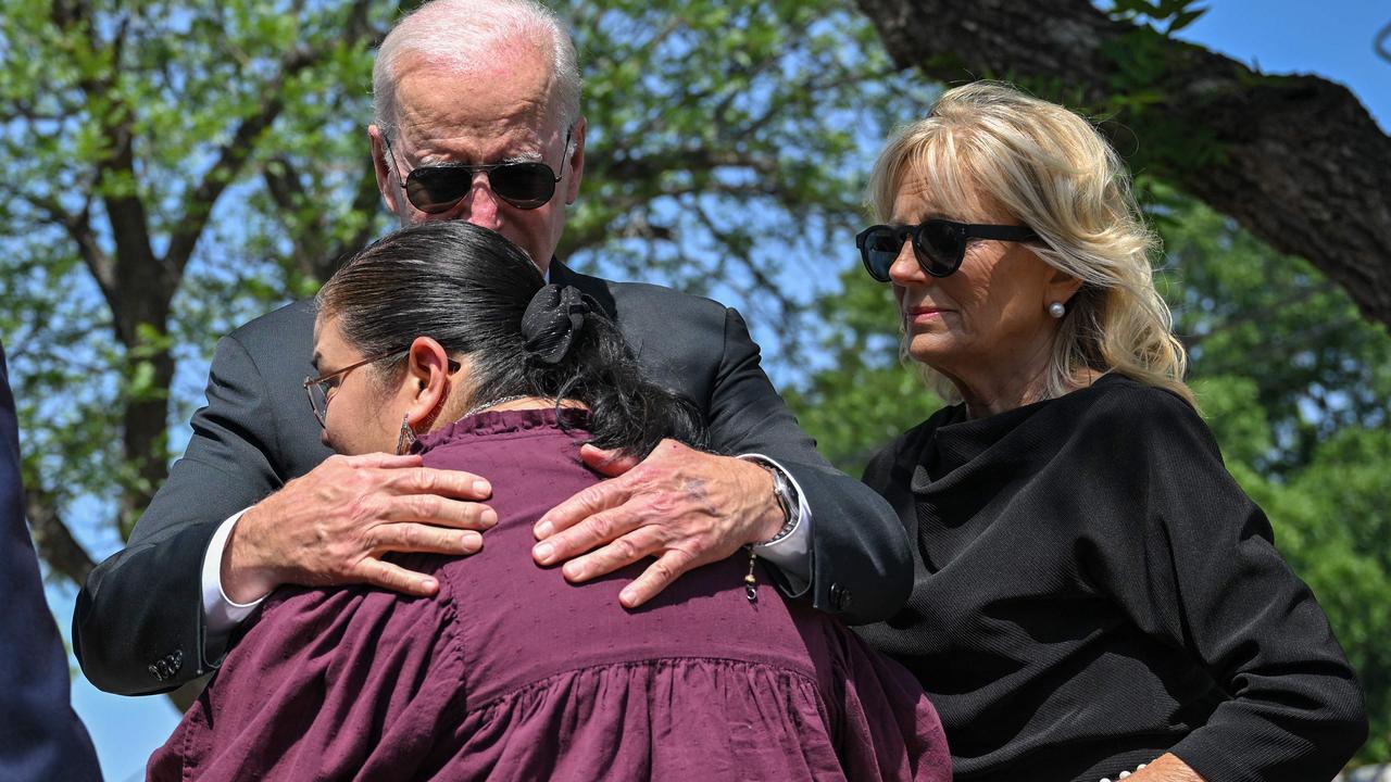 US President Joe Biden embraces Mandy Gutierrez, the Priciple of Robb Elementary School, as he and First Lady Jill Biden pay their in Uvalde, Texas. P{icture: MANDEL NGAN / AFP