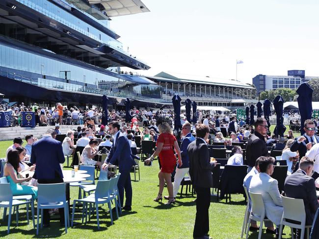 The early racegoer gets the table: punters stake out their spots early at Royal Randwick. Picture: Sam Ruttyn