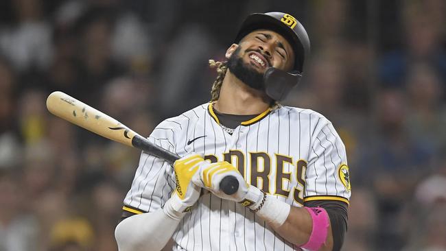 SAN DIEGO, CA - SEPTEMBER 21: Fernando Tatis Jr. #23 of the San Diego Padres reacts after striking out during the ninth inning of a baseball game against the San Francisco Giants at Petco Park on September 21, 2021 in San Diego, California.  (Photo by Denis Poroy/Getty Images)