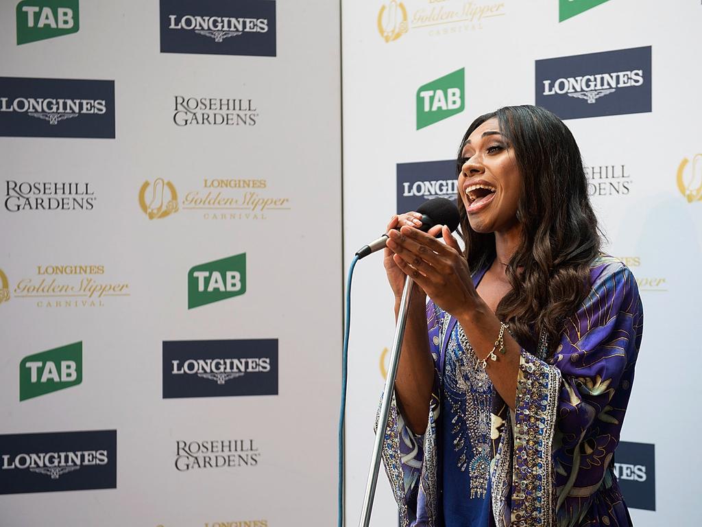 Paulini sings the National Anthem during Golden Slipper Day at Rosehill Gardens.