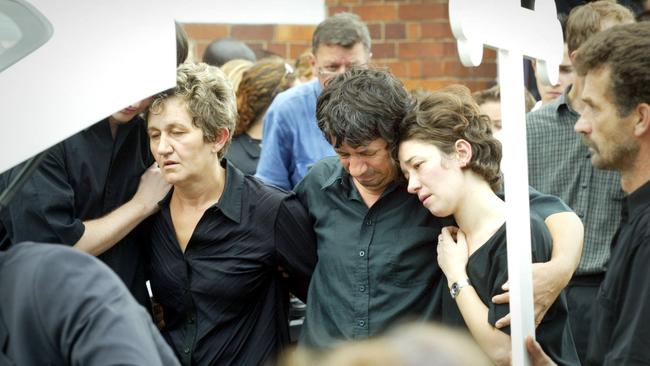 The funeral of Vladislava Mrmos at the Serbian Orthodox Church of St. Nicholas at South Brisbane. Pictured are her grieving parents, Janja and Vladimir and her sister Helena. 