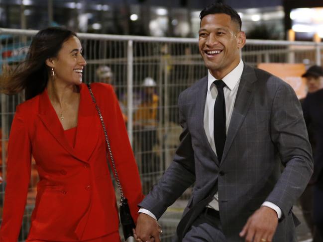 MELBOURNE, AUSTRALIA - DECEMBER 02: Maria Folau holds hands with husband Israel Folau as he leaves Federal Court on December 02, 2019 in Melbourne, Australia. Folau is meeting with Rugby Australia to begin mediation talks surrounding his dismissal from his Rugby Australia contract for player code breaches. (Photo by Darrian Traynor/Getty Images)