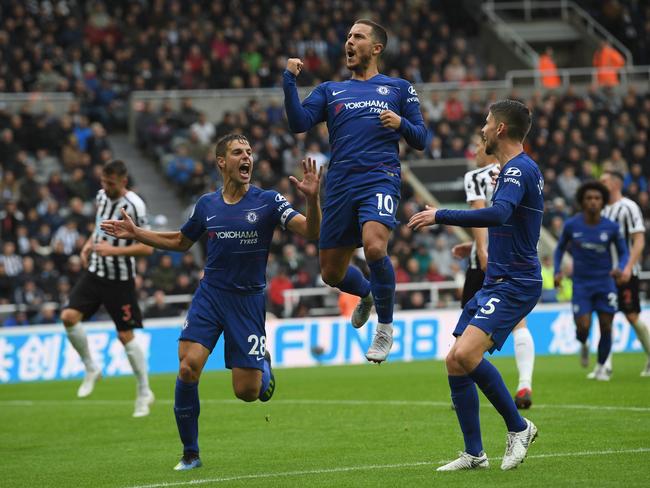 NEWCASTLE UPON TYNE, ENGLAND - AUGUST 26:  Chelsea player Eden Hazard (c) ceebrates after scoring the first chelsea goal during the Premier League match between Newcastle United and Chelsea FC at St. James Park on August 26, 2018 in Newcastle upon Tyne, United Kingdom.  (Photo by Stu Forster/Getty Images) *** BESTPIX ***