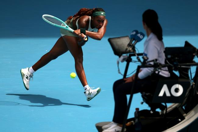 Coco Gauff hits a return against Switzerland's Belinda Bencic