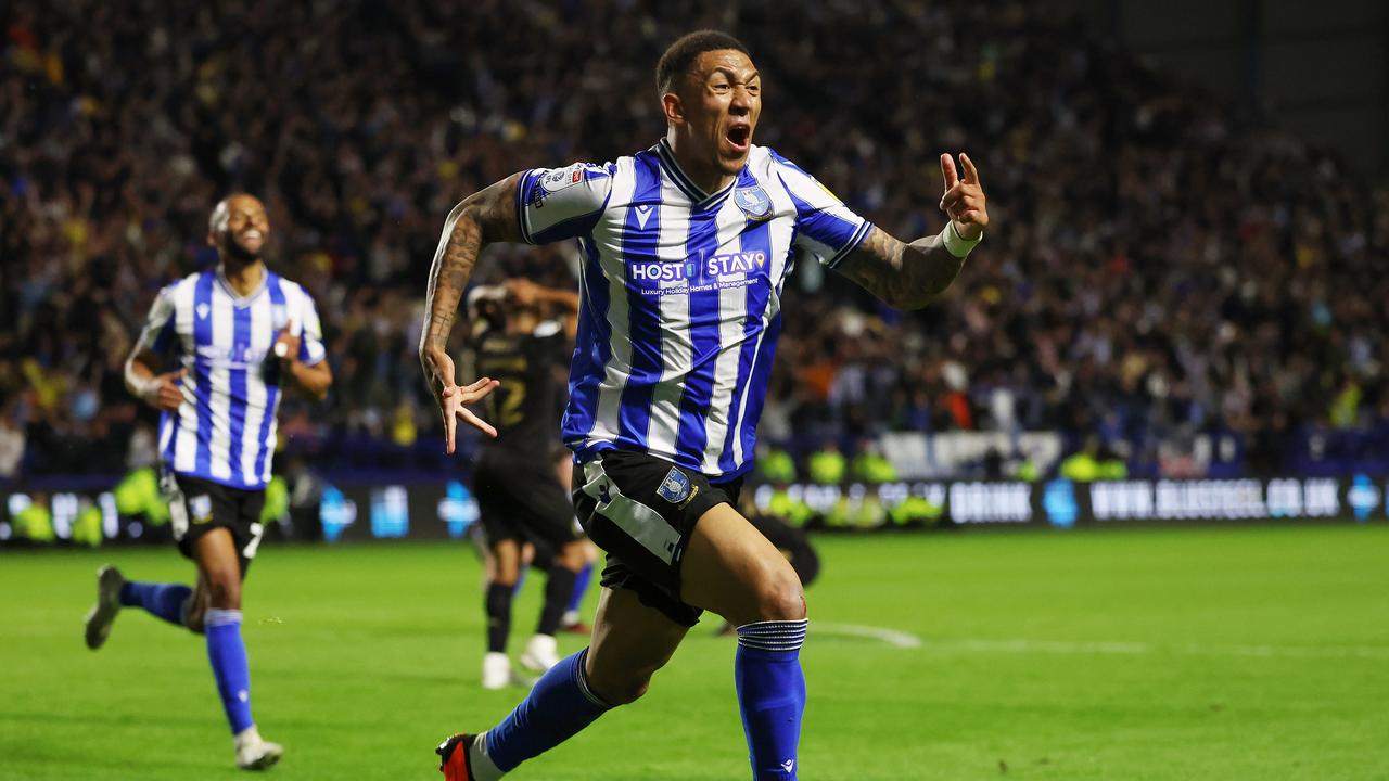 Liam Palmer was ecstatic after scoring Sheffield Wednesday's fourth with the final kick of the game. (Photo by Matt McNulty/Getty Images)