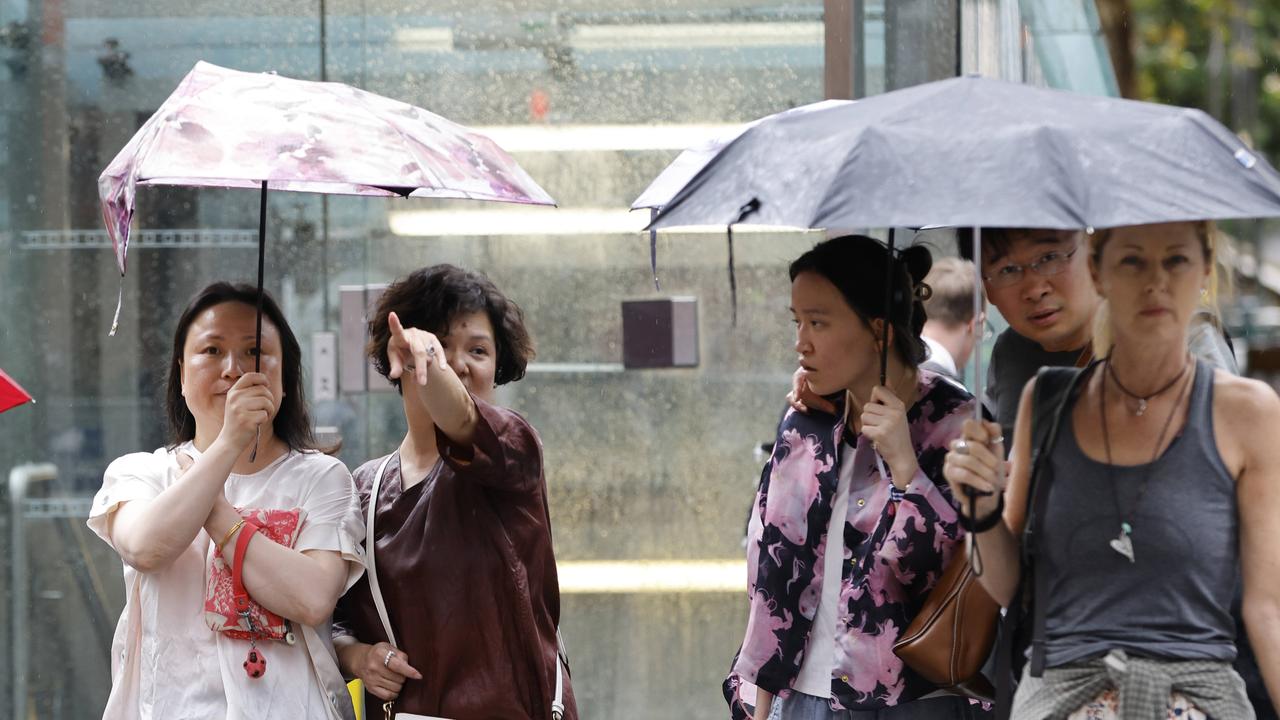 Residents were urged to stay inside as the barrage of rain lambasted the city. Picture: NewsWire / Damian Shaw