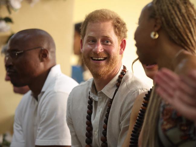 Prince Harry was all smiles after a difficult few days in London. Picture: AFP