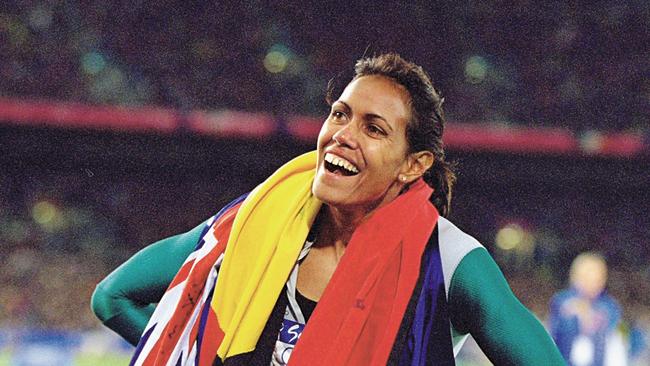 Cathy Freeman with “the two Australian flags.” (Picture: Nick Wilson /Allsport)