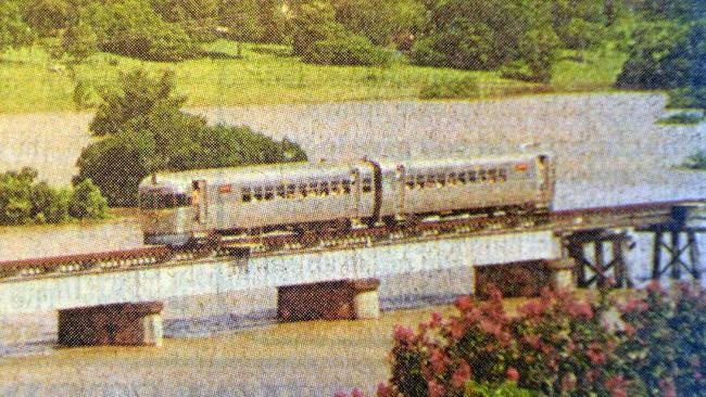 1999 FLOOD: The Mary Valley Heritage Railway&#39;s rail motor provided a vital link between Gympie and Monkland during the February flood, ferrying workers back and forth across the high level Deep Creek rail bridge. Picture: Renee Albrecht