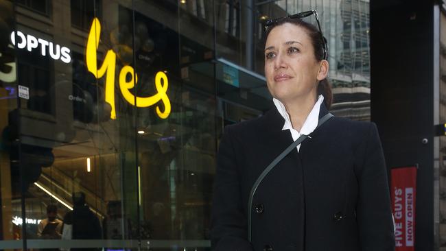 Optus customer Evie Adasal outside the Optus store in George Street, Sydney. Picture: John Appleyard