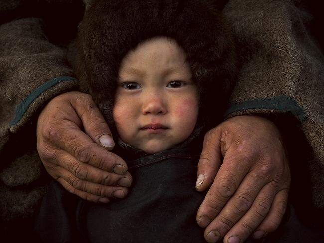 The family of nomadic herders living at the Polar Urals. Picture: Vladimir Kushnarev/ National Geographic Photo Contest