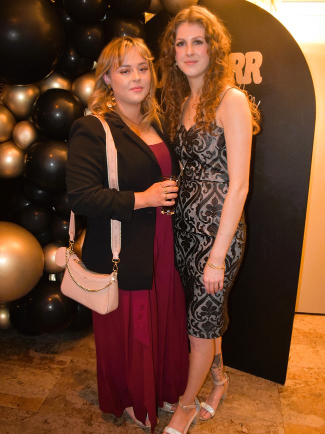 Abbey Pleydell and Annie Bass having a great night at the Cowwarr Saints Football &amp; Netball Club Golden Gala Ball 2024. Picture: Jack Colantuono