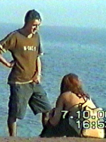 Police surveillance pictures of gang rapists at Bondi Beach on October 7, 2000 including Mohammed Skaf talking to a woman.