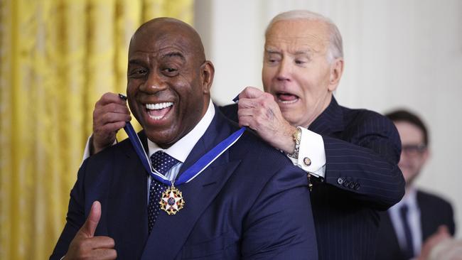 Earvin “Magic” Johnson made the effort to be there. Photo by Tom Brenner/Getty Images.