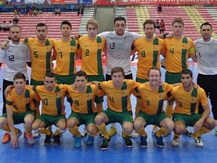 Minto resident Dean Lockhart, second from right in bottom row, with the Futsalroos at the AFF Futsal championships in Thailand.