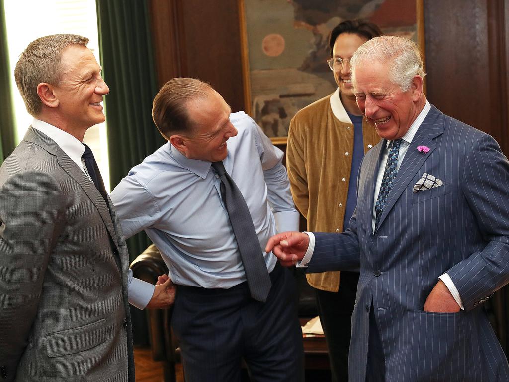 Prince Charles, with Daniel Craig, Ralph Fiennes and director Cary Joji Fukunaga, visited the No Time to Die set in London last year. Picture: Getty Images