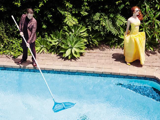 Lachlan likes to do the cleaning, although not usually in a Bally jacket, Cos top, Ted Baker pants and shoes. Emma shows off her love of yellow in a Maticevski gown with Max Mara sunglasses, Lucilla Gray earrings and Boden shoes.