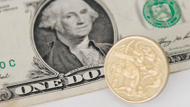 A 1 Australian Dollar coin and a 1 US Dollar note are seen in Canberra, Tuesday, May 21, 2013. As the US economy rebounds, there are predictions that the Australian dollar could fall as low as 90 US cents in the coming weeks and months. (AAP Image/Lukas Coch) NO ARCHIVING