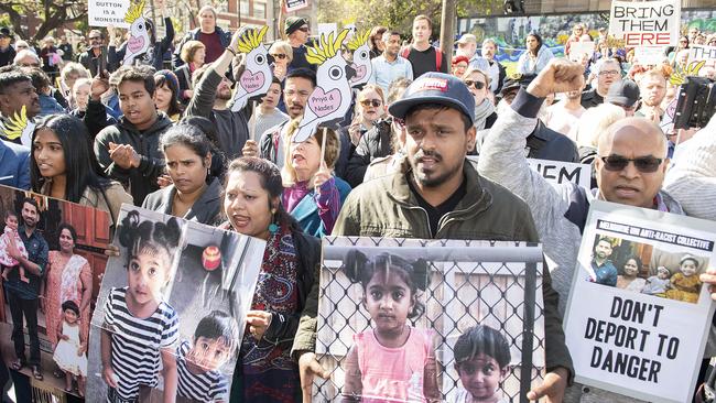 Supporters of the Nadesalingam family at a rally outside the State Library of Victoria, Melbourne, Sunday September 1, 2019. (AAP Image/Ellen Smith)