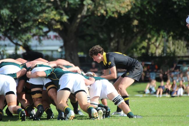 Josh Madden feeds the ball into the scrum.