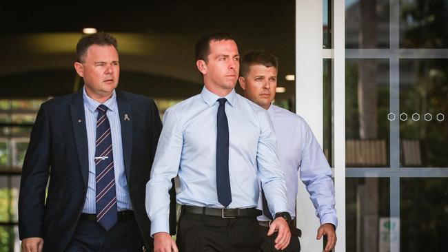 NT Police Officer Zachary Rolfe (centre) appeared in court on Monday, July 19 for the first day of his trial. He stands accused of the shooting murder of 19-year-old Kumanjayi Walker in the remote community of Yuendumu in November 2019.