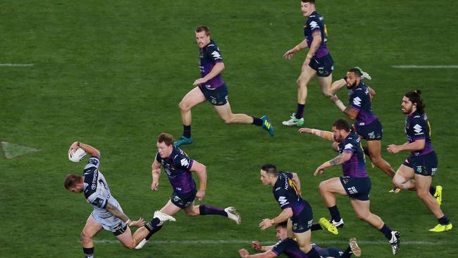 SYDNEY, AUSTRALIA - OCTOBER 01:  Kyle Feldt of the Cowboys makes a break during the 2017 NRL Grand Final match between the Melbourne Storm and the North Queensland Cowboys at ANZ Stadium on October 1, 2017 in Sydney, Australia.  (Photo by Jason McCawley/Getty Images)