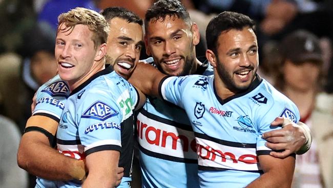 Matt Ikuvalu (second from left) is out for the season. Picture: Cameron Spencer/Getty Images