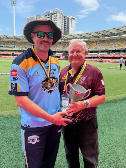 Pictured: Fusion captain Jake Roach and Queensland Country Cricket President Kev Maher. Far North Fusion crowned 2024 Bulls Masters champions. Supplied by Queensland Country Cricket.