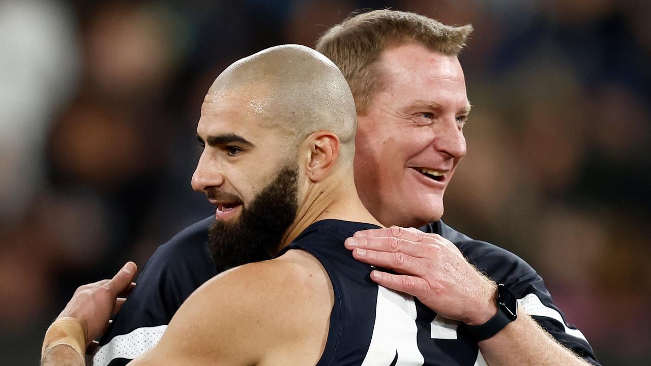 MELBOURNE, AUSTRALIA - JULY 28: Michael Voss, Senior Coach of the Blues and Adam Saad of the Blues celebrate during the 2023 AFL Round 20 match between the Collingwood Magpies and the Carlton Blues at The Melbourne Cricket Ground on July 28, 2023 in Melbourne, Australia. (Photo by Michael Willson/AFL Photos via Getty Images)