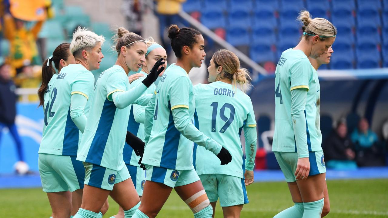 The Matildas celebrate during their 3-0 win over Uzbekistan. Picture: Tolib Kosimov/Getty Images