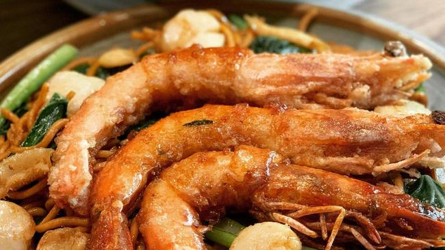 Chinta Ria’s golden prawns with prosperity noodles. Picture: Facebook