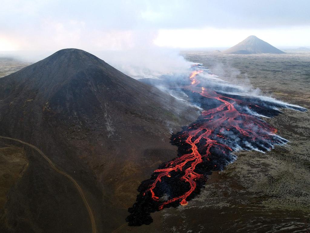 Gudmundur Hauksson, a 26-year-old Icelandic who was also among the first there, said “it’s really nice... to come out and connect with the Earth and nature in this fashion.” The powerful smell of volcanic gases and flowing lava is reminiscent of “a big barbecue”, according to some visitors. Picture: Jeremie RICHARD / AFP