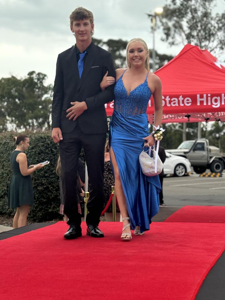 Students from Urangan State High School arrive at their formal.