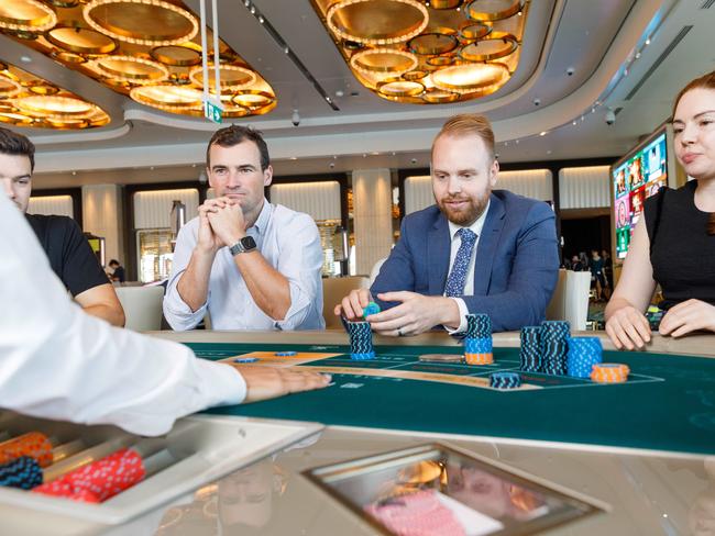 DAILY TELEGRAPH. Crown Casino opened its doors for media to tour its newly reopened gaming floor. Picture shows Casino staff playing a demonstration game of blackjack. 02/02/2024. Picture by Max Mason-Hubers