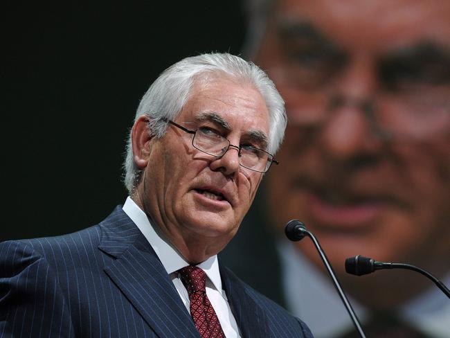 (FILES) This file photo taken on June 2, 2015 shows Exxon Mobil Chairman and CEO Rex Tillerson addressing the World Gas Conference in Paris. President-elect Donald Trump on Tuesday tapped ExxonMobil chief Rex Tillerson, an oilman with deep ties to Russia, as his secretary of state. Tillerson's nomination comes just days after a secret CIA report accused Russia of interfering with the US election in favor of Trump, in a development which could complicate his confirmation. / AFP PHOTO / ERIC PIERMONT