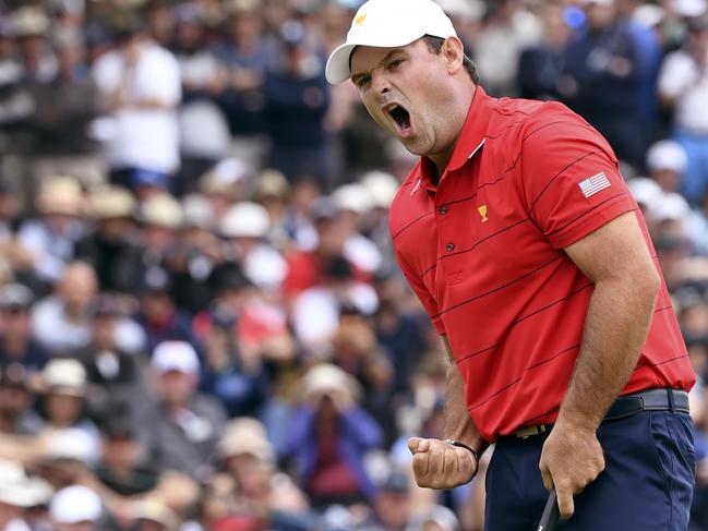 Reed reacts after sinking a birdie putt to silence his hecklers. Picture: AFP