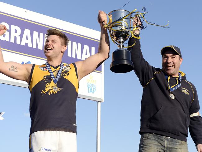 Andrew Fairchild and Whittlesea coach Brad Dean soak up the club’s 2015 premiership success. Picture: Josie Hayden