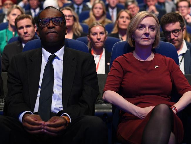 (FILES) In this file photo taken on October 2, 2022 Britain's Chancellor of the Exchequer Kwasi Kwarteng (L) and Britain's Prime Minister Liz Truss (R) attend the opening day of the annual Conservative Party Conference in Birmingham, central England. - Kwarteng has been sacked, the BBC and Sky News reported on October 14, 2022 quoting unnamed sources, as Truss tries to save her beleaguered premiership. (Photo by Oli SCARFF / AFP)