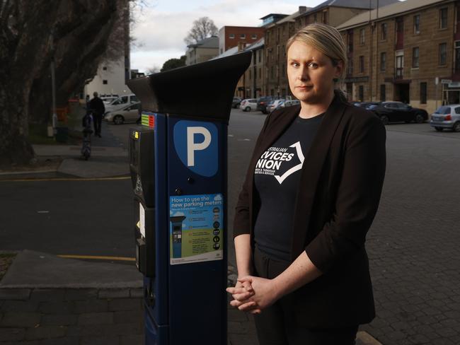 Sam Batchelor Tasmanian coordinator Australian Services Union with a parking meter in Salamanca Place.  Hobart City Council parking officers say the city's parking management system is not working and they are stressed because they're issuing fines to people who have done nothing wrong.  Picture: Nikki Davis-Jones