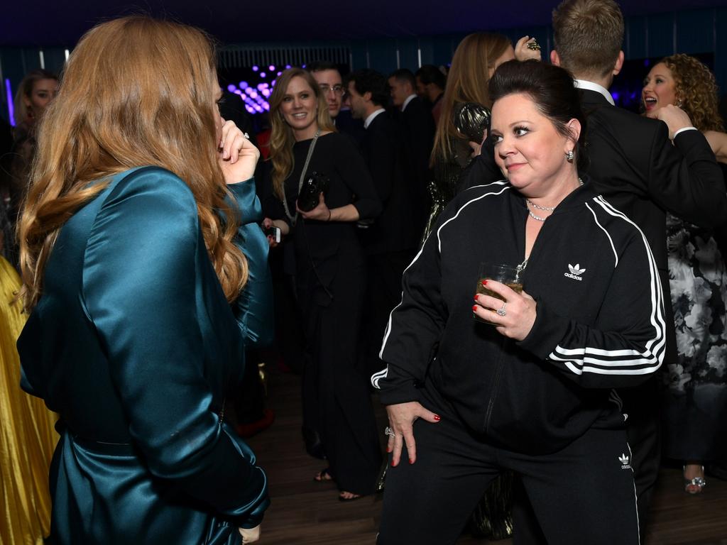 Melissa McCarthy shows Amy Adams how much easier it is to dance in a tracksuit. Picture: Emma McIntyre /VF19/WireImage/Getty Images