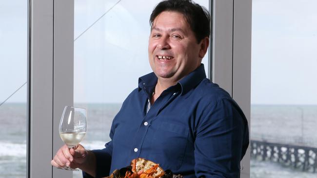 Filipe Horta at his beachside restaurant in Port Noarlunga. AAP/Emma Brasier