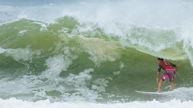 Final bound Julian Wilson finds a barrel at Snapper Rocks