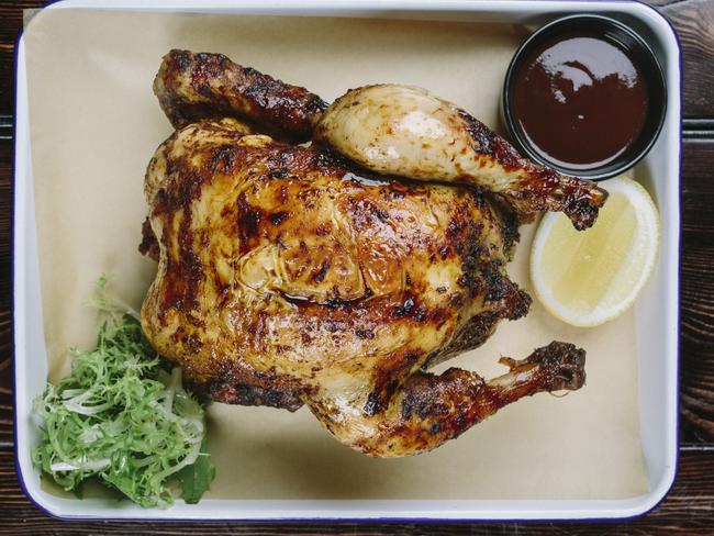 Spit roasted chicken can be paired with peas and peppers or broccoli at  Meatmother. Picture: Supplied