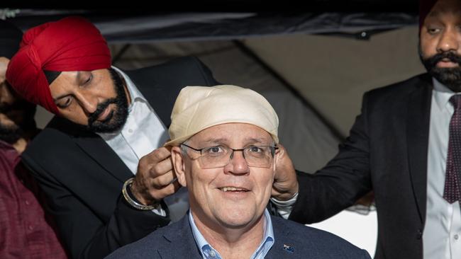 Mr Morrison at a multicultural community event with members of the Sikh Community from the La Trobe electorate and surrounds. Picture: Jason Edwards