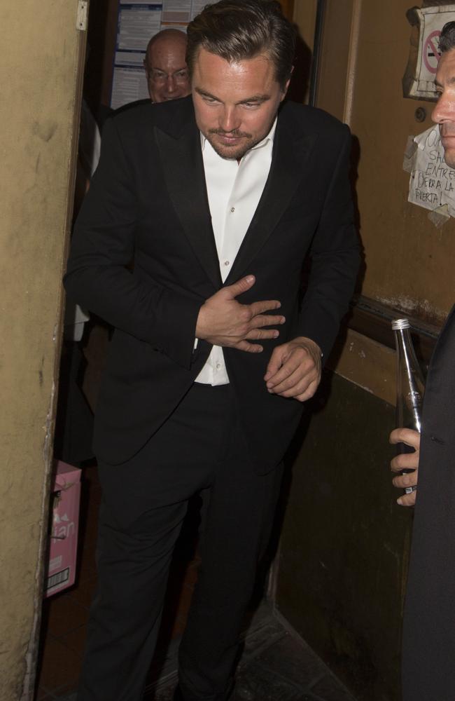 A bow tie-less Leo was snapped leaving Ago in the early hours of the morning, as part of his post-Oscars celebration. Picture: Splash